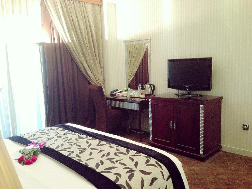 Abjad Grand Hotel Dubai Room photo